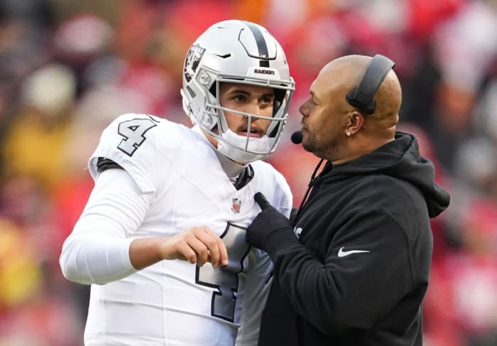 Las Vegas Raiders Coach Antonio Pierce (right) wants his quarterback to be a leader, be competitive, and be a winner.
